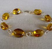 Armband med gula glaspärlor